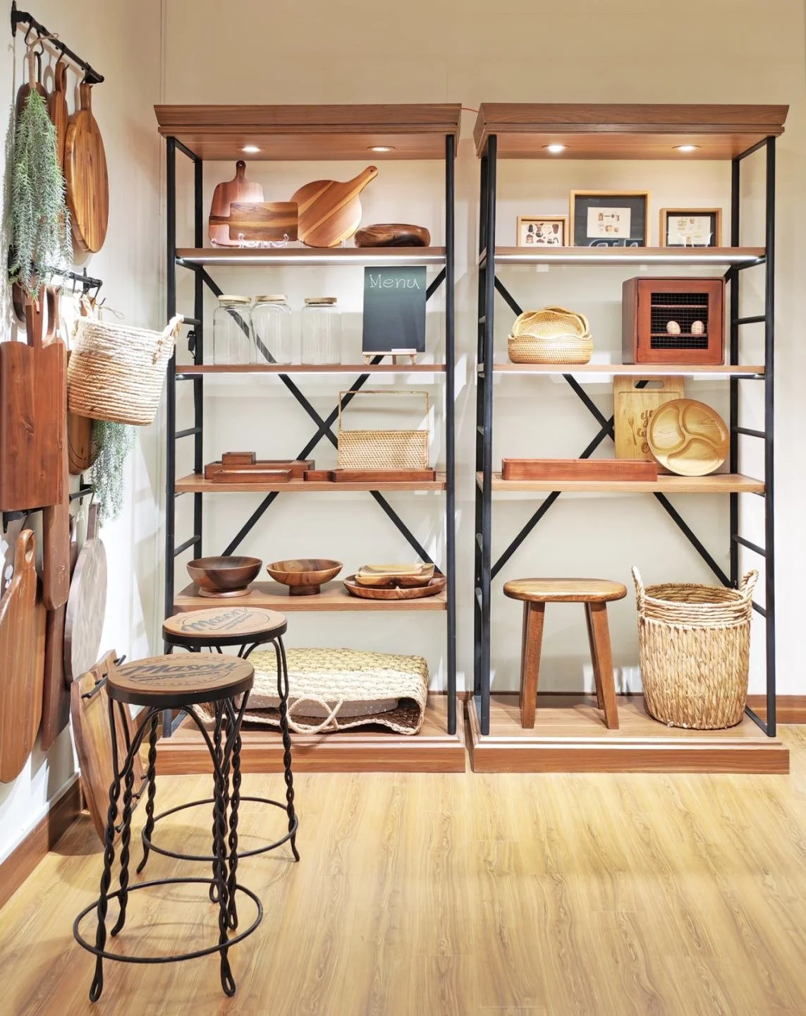 Shelves of wooden serveware and boards