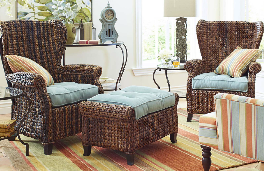 Handwoven rattan armchairs and ottoman